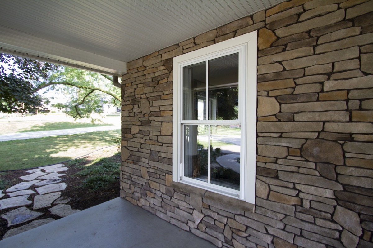 Energy-efficient ProVia replacement windows on a home exterior